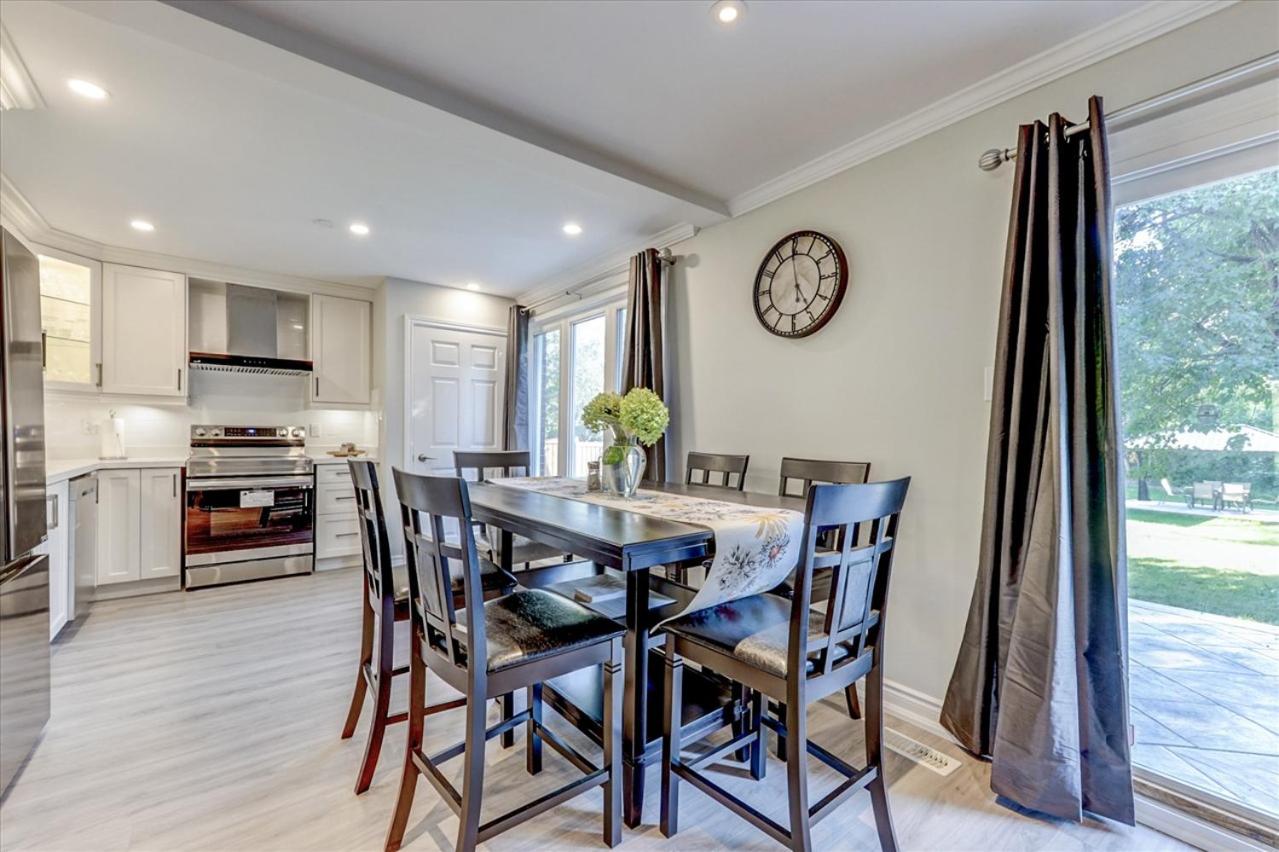 Stunning 7 Br RougeView Home with 2 Kitchens, 5 Bathrooms, Amazing Backyard & 8-Car Parking