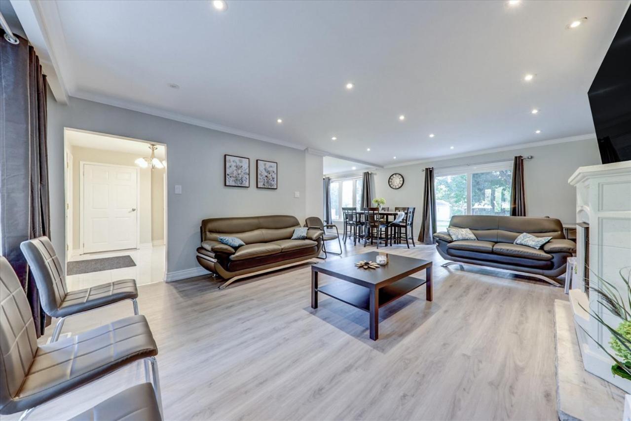 Stunning 7 Br RougeView Home with 2 Kitchens, 5 Bathrooms, Amazing Backyard & 8-Car Parking