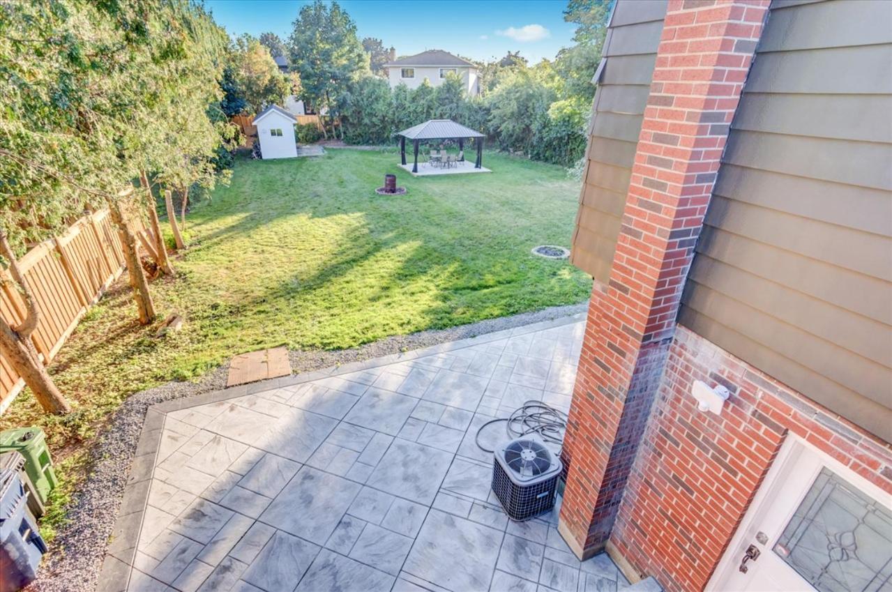 Stunning 7 Br RougeView Home with 2 Kitchens, 5 Bathrooms, Amazing Backyard & 8-Car Parking
