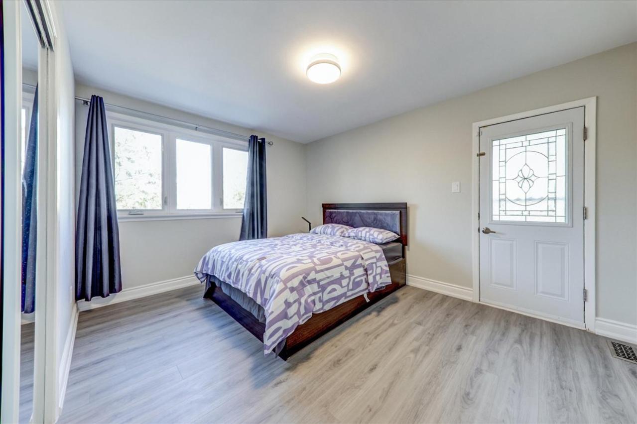 Stunning 7 Br RougeView Home with 2 Kitchens, 5 Bathrooms, Amazing Backyard & 8-Car Parking