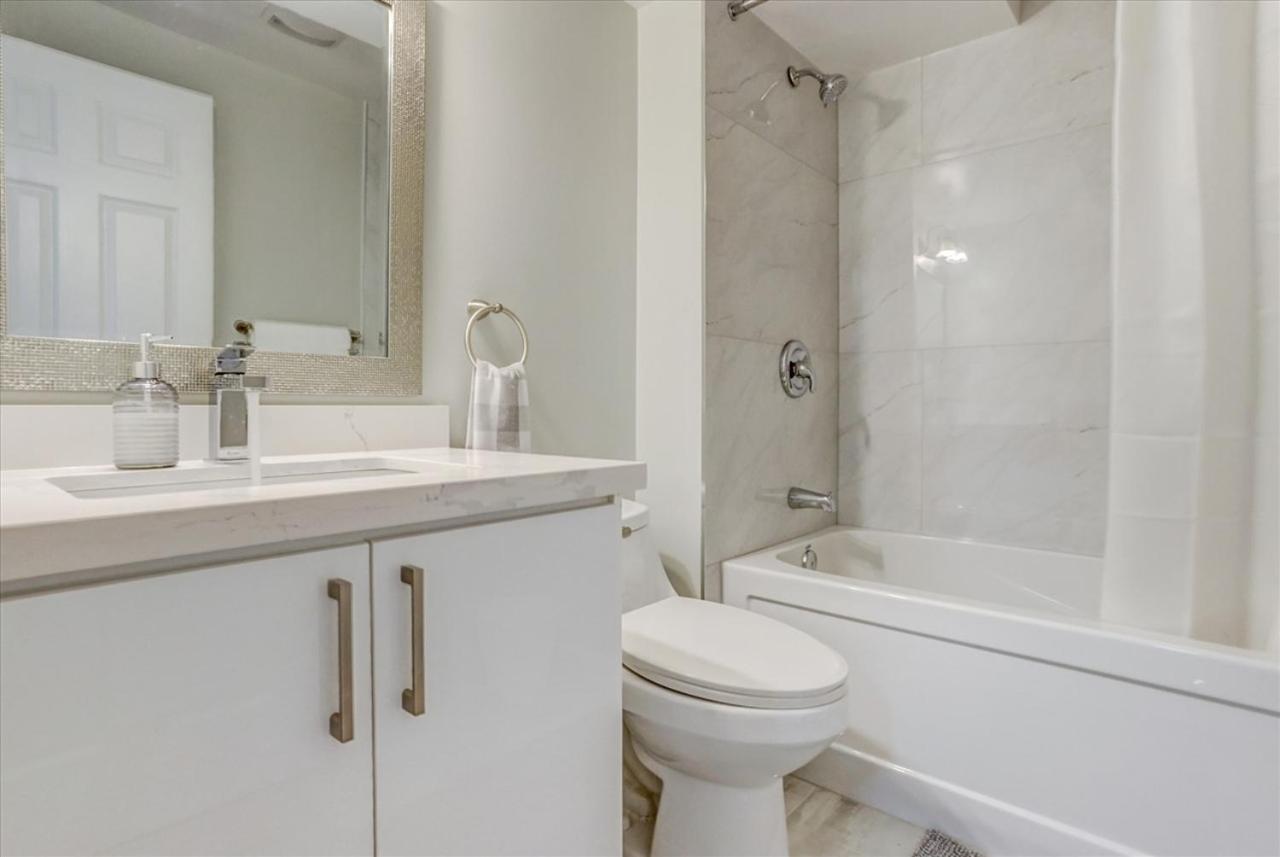 Stunning 7 Br RougeView Home with 2 Kitchens, 5 Bathrooms, Amazing Backyard & 8-Car Parking
