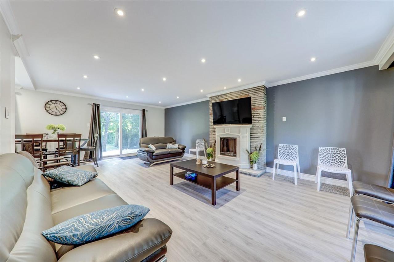 Stunning 7 Br RougeView Home with 2 Kitchens, 5 Bathrooms, Amazing Backyard & 8-Car Parking