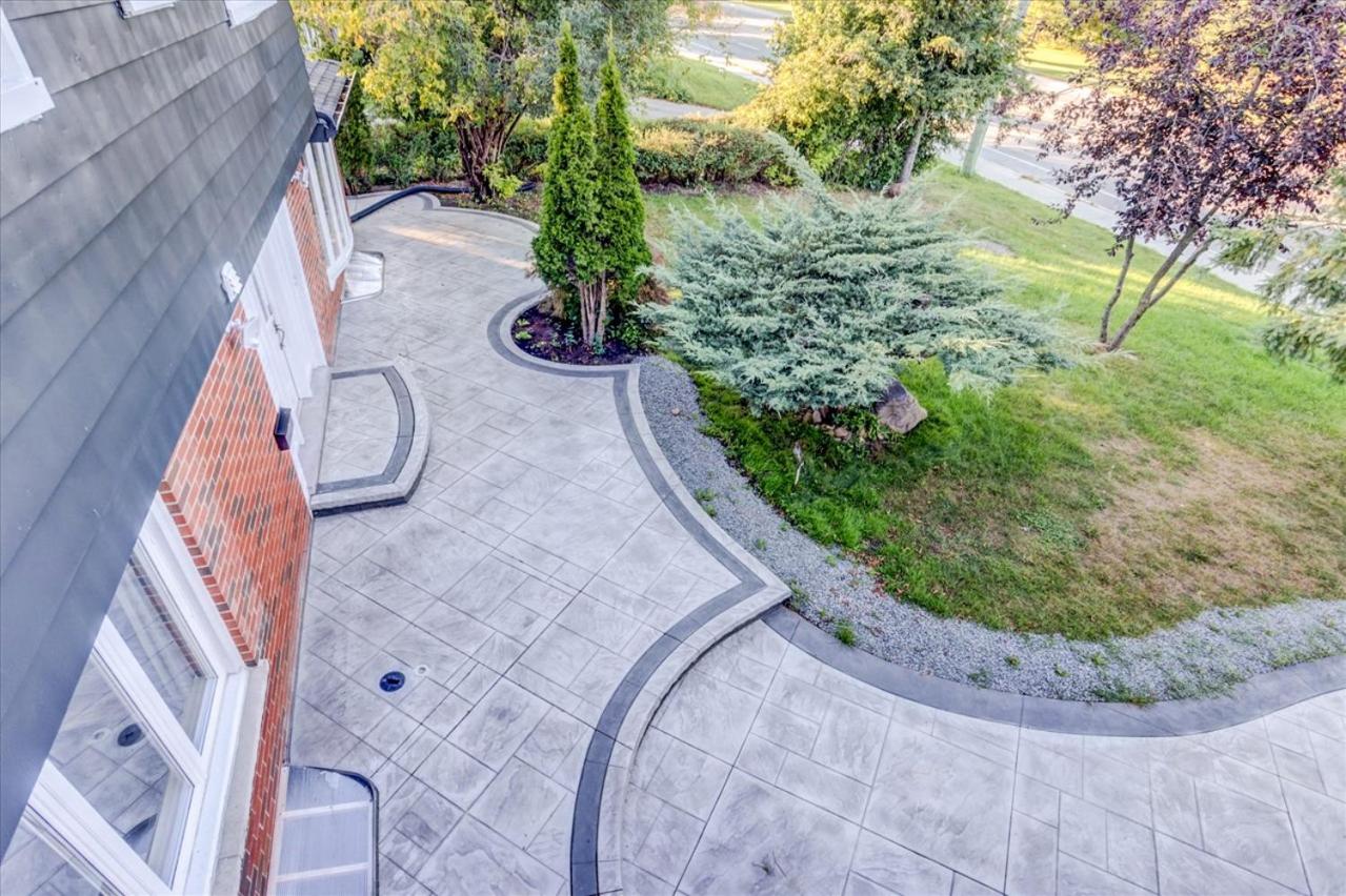 Stunning 7 Br RougeView Home with 2 Kitchens, 5 Bathrooms, Amazing Backyard & 8-Car Parking