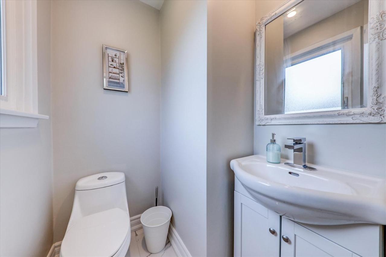 Stunning 7 Br RougeView Home with 2 Kitchens, 5 Bathrooms, Amazing Backyard & 8-Car Parking