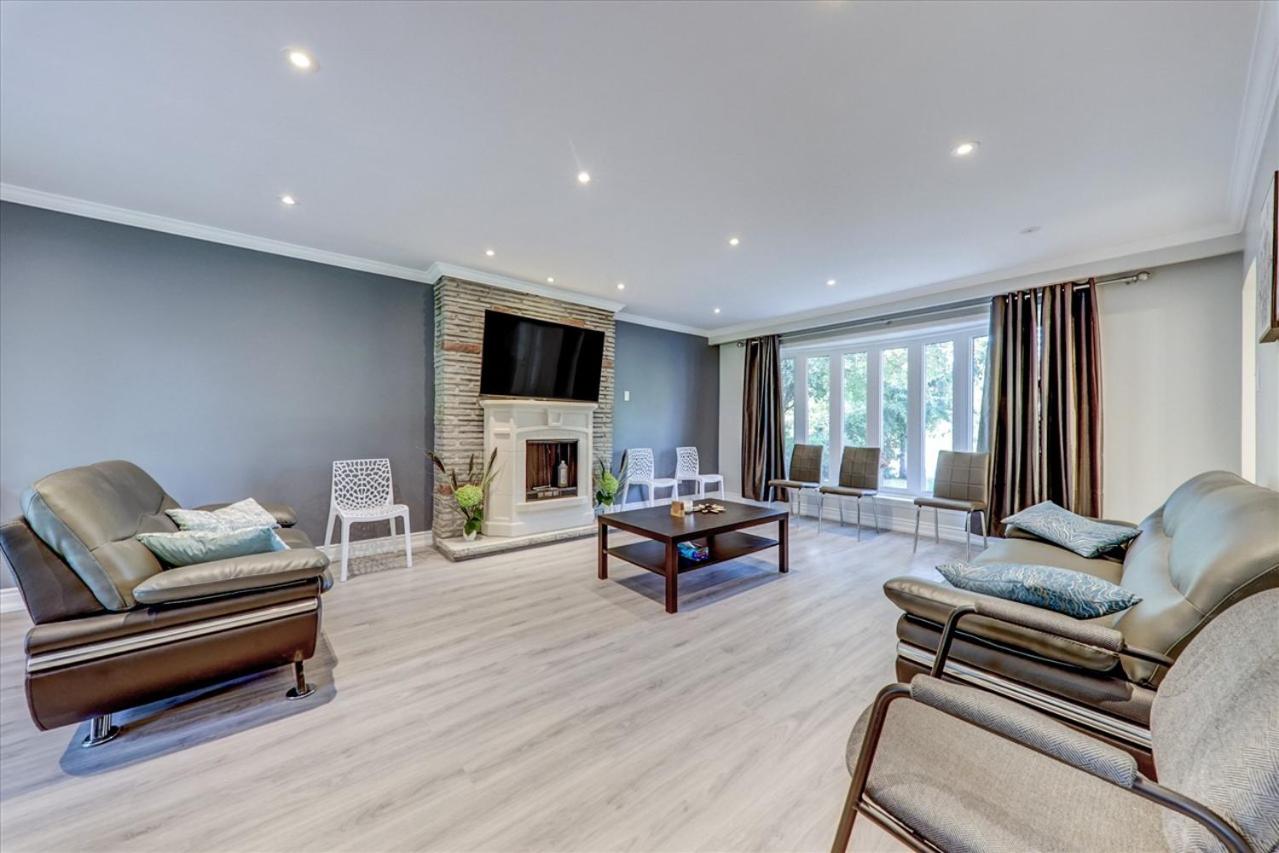 Stunning 7 Br RougeView Home with 2 Kitchens, 5 Bathrooms, Amazing Backyard & 8-Car Parking