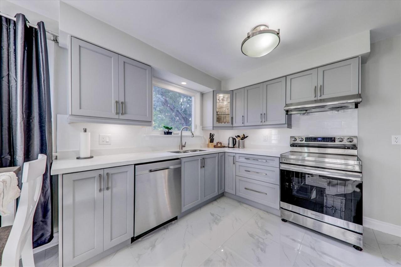 Stunning 7 Br RougeView Home with 2 Kitchens, 5 Bathrooms, Amazing Backyard & 8-Car Parking