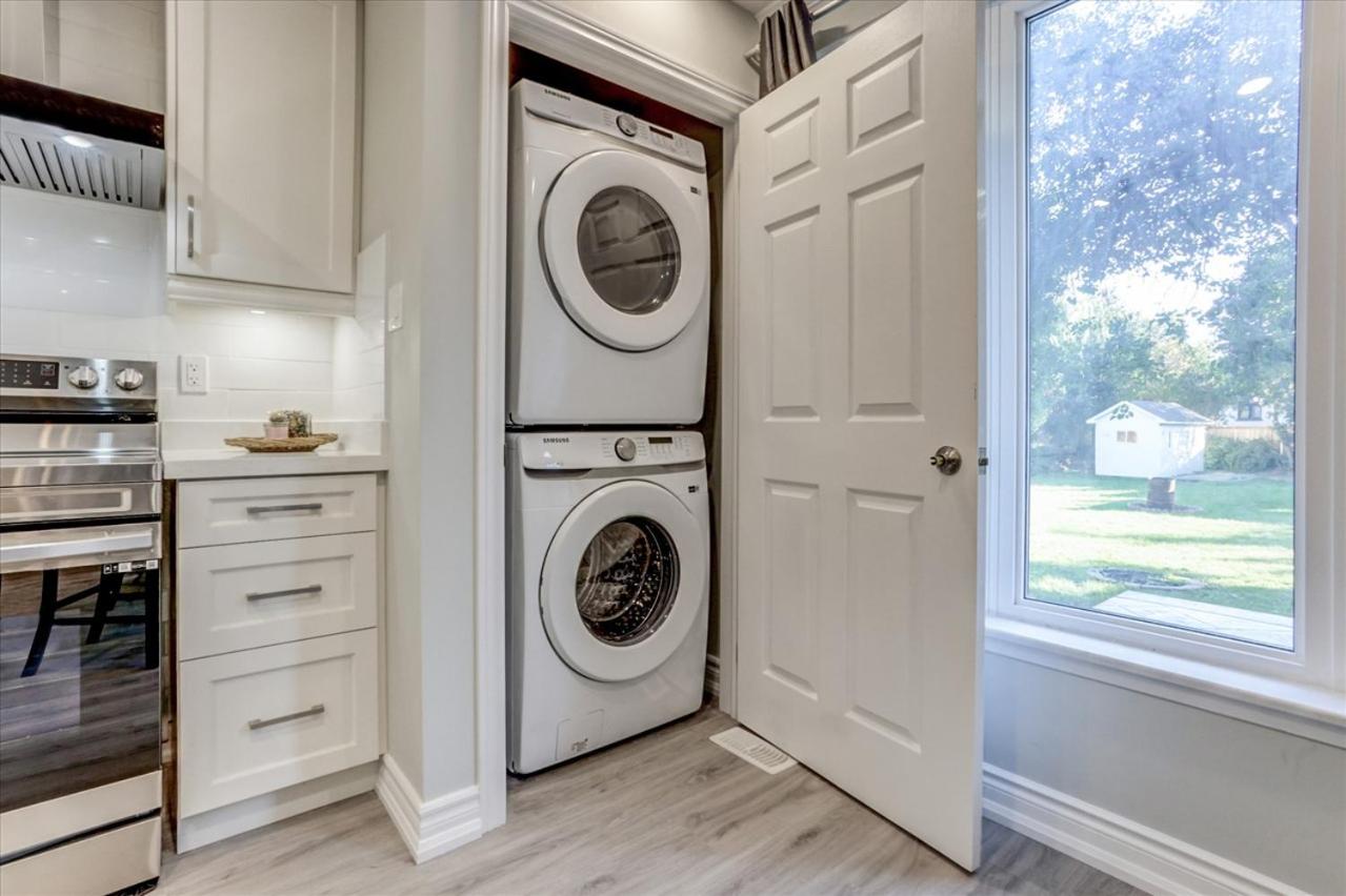 Stunning 7 Br RougeView Home with 2 Kitchens, 5 Bathrooms, Amazing Backyard & 8-Car Parking