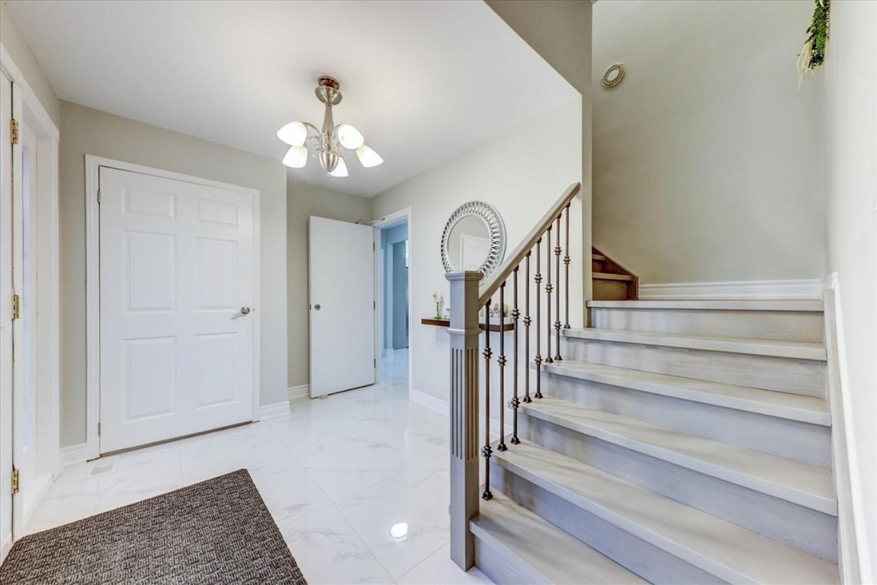 Stunning 7 Br RougeView Home with 2 Kitchens, 5 Bathrooms, Amazing Backyard & 8-Car Parking