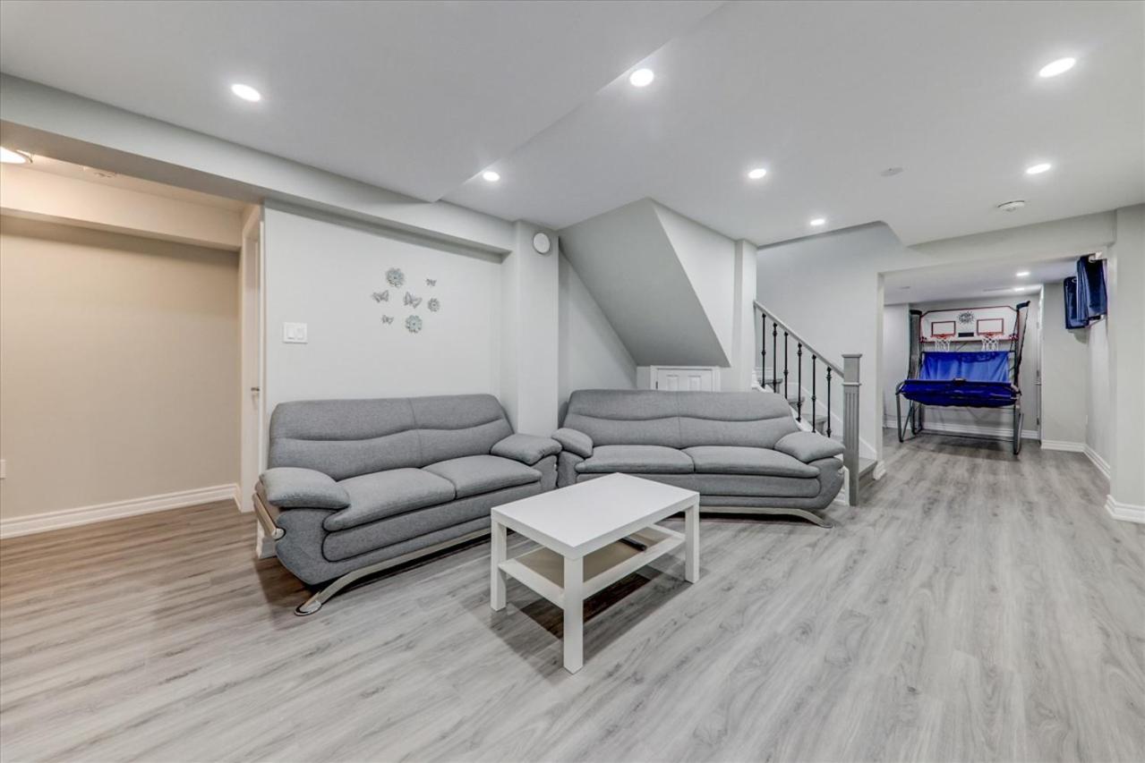 Stunning 7 Br RougeView Home with 2 Kitchens, 5 Bathrooms, Amazing Backyard & 8-Car Parking