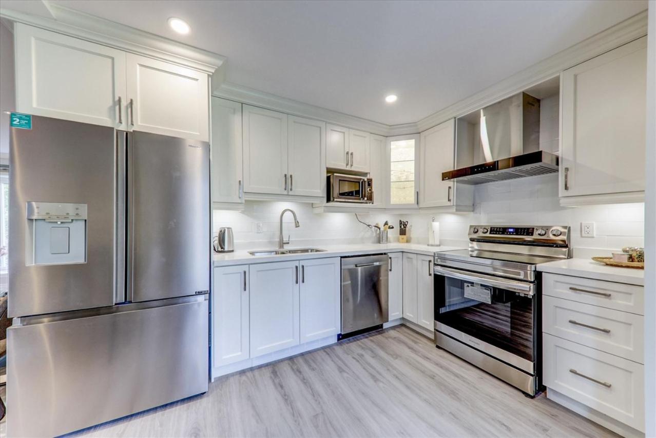 Stunning 7 Br RougeView Home with 2 Kitchens, 5 Bathrooms, Amazing Backyard & 8-Car Parking