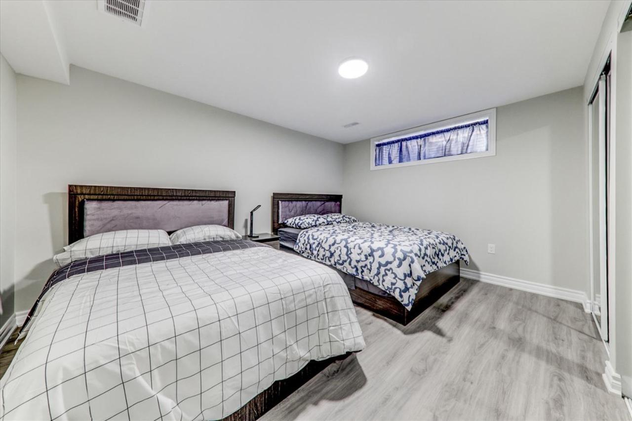 Stunning 7 Br RougeView Home with 2 Kitchens, 5 Bathrooms, Amazing Backyard & 8-Car Parking
