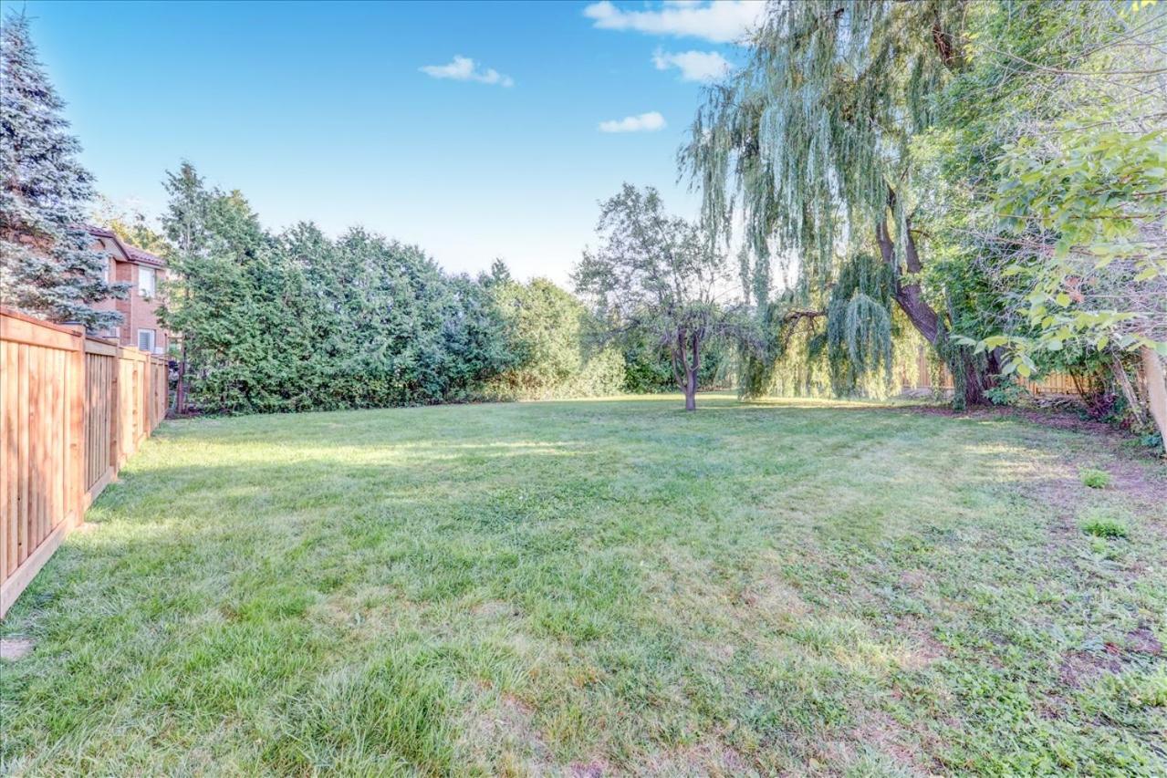 Stunning 7 Br RougeView Home with 2 Kitchens, 5 Bathrooms, Amazing Backyard & 8-Car Parking