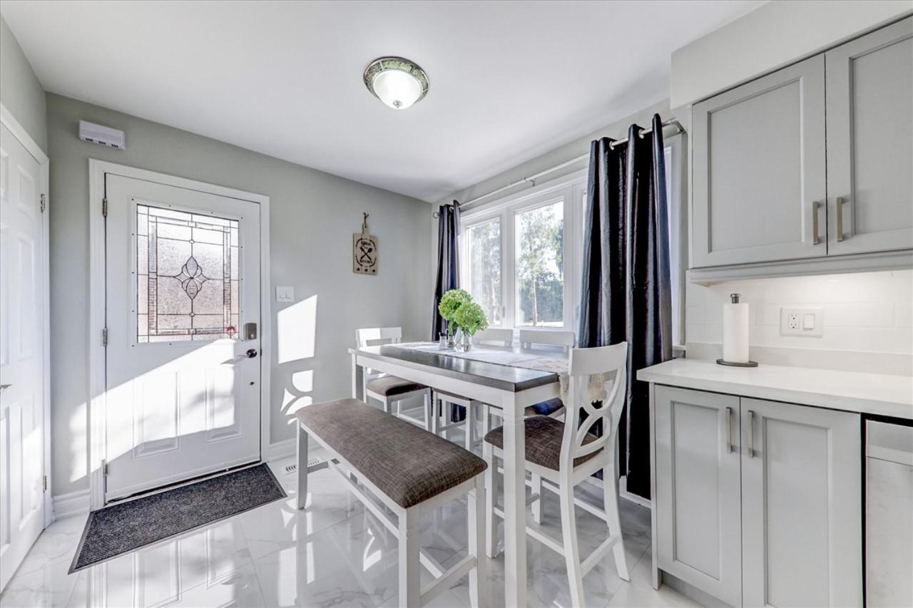 Stunning 7 Br RougeView Home with 2 Kitchens, 5 Bathrooms, Amazing Backyard & 8-Car Parking