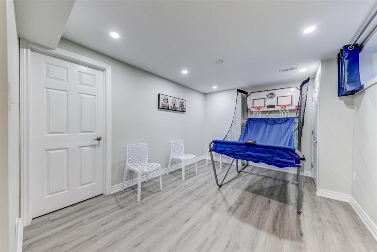 Stunning 7 Br RougeView Home with 2 Kitchens, 5 Bathrooms, Amazing Backyard & 8-Car Parking