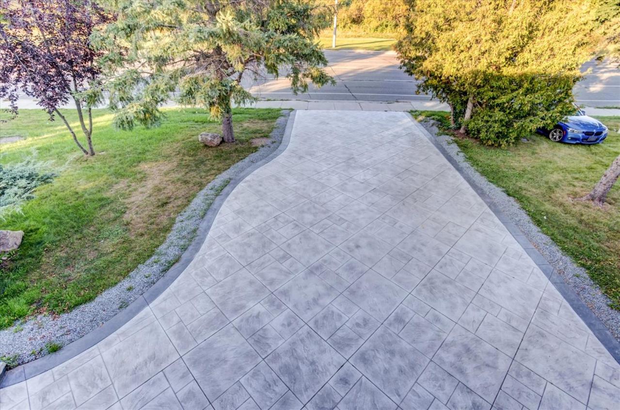 Stunning 7 Br RougeView Home with 2 Kitchens, 5 Bathrooms, Amazing Backyard & 8-Car Parking