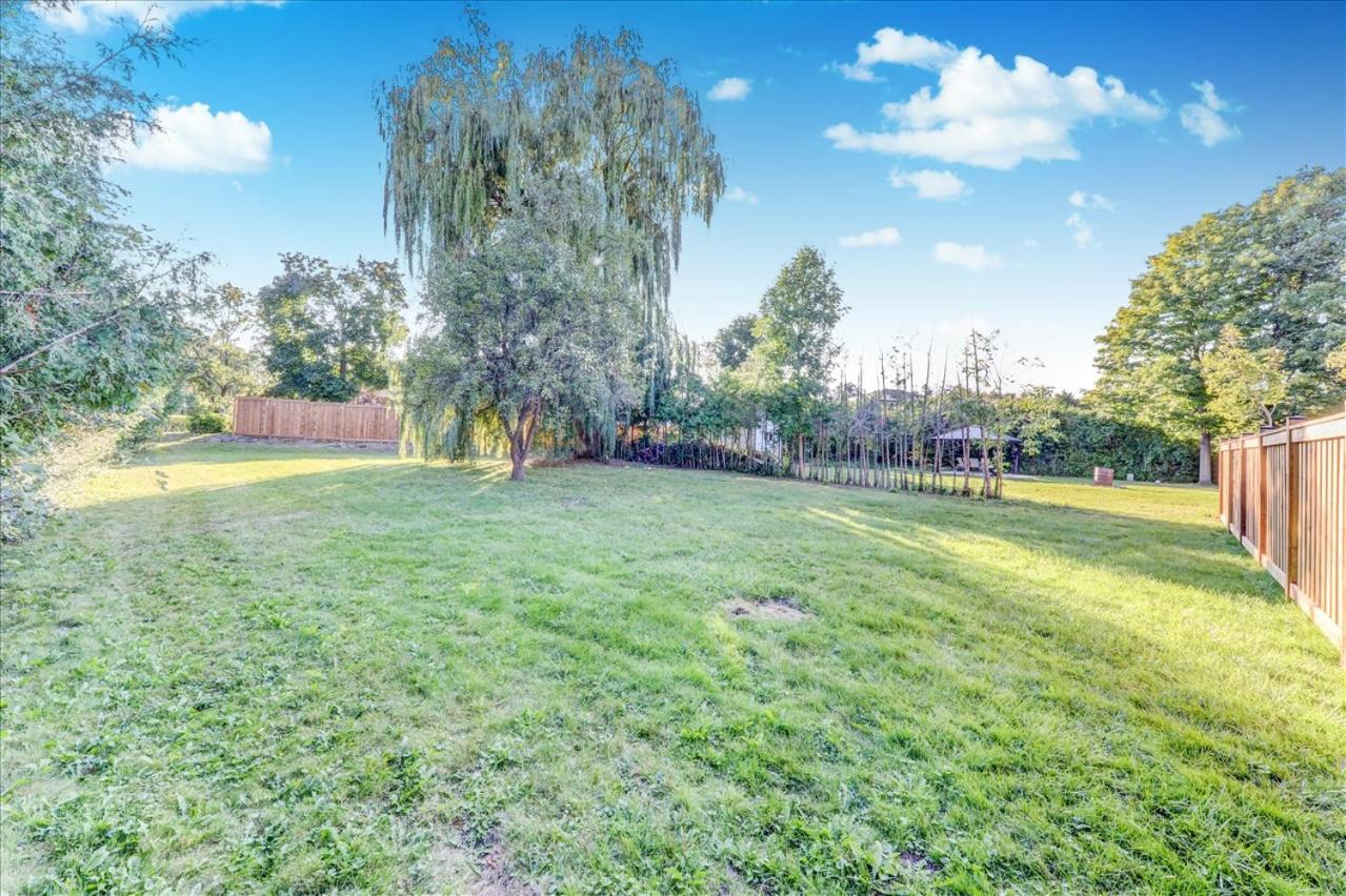 Stunning 7 Br RougeView Home with 2 Kitchens, 5 Bathrooms, Amazing Backyard & 8-Car Parking