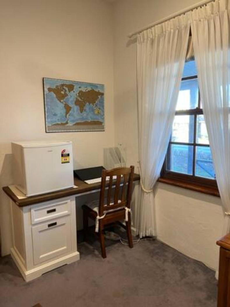 Two roomed private suite in front of cottage