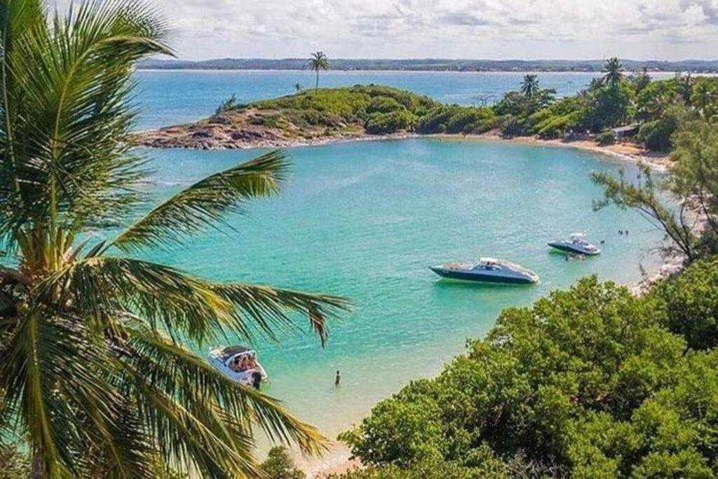 Piscina aquecida, 5 suítes e pé na areia com vista espetacular!!