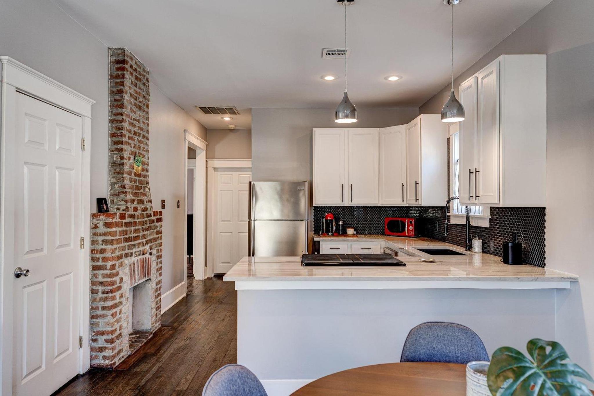 Creole-style home w fenced yard & chefs kitchen view 2