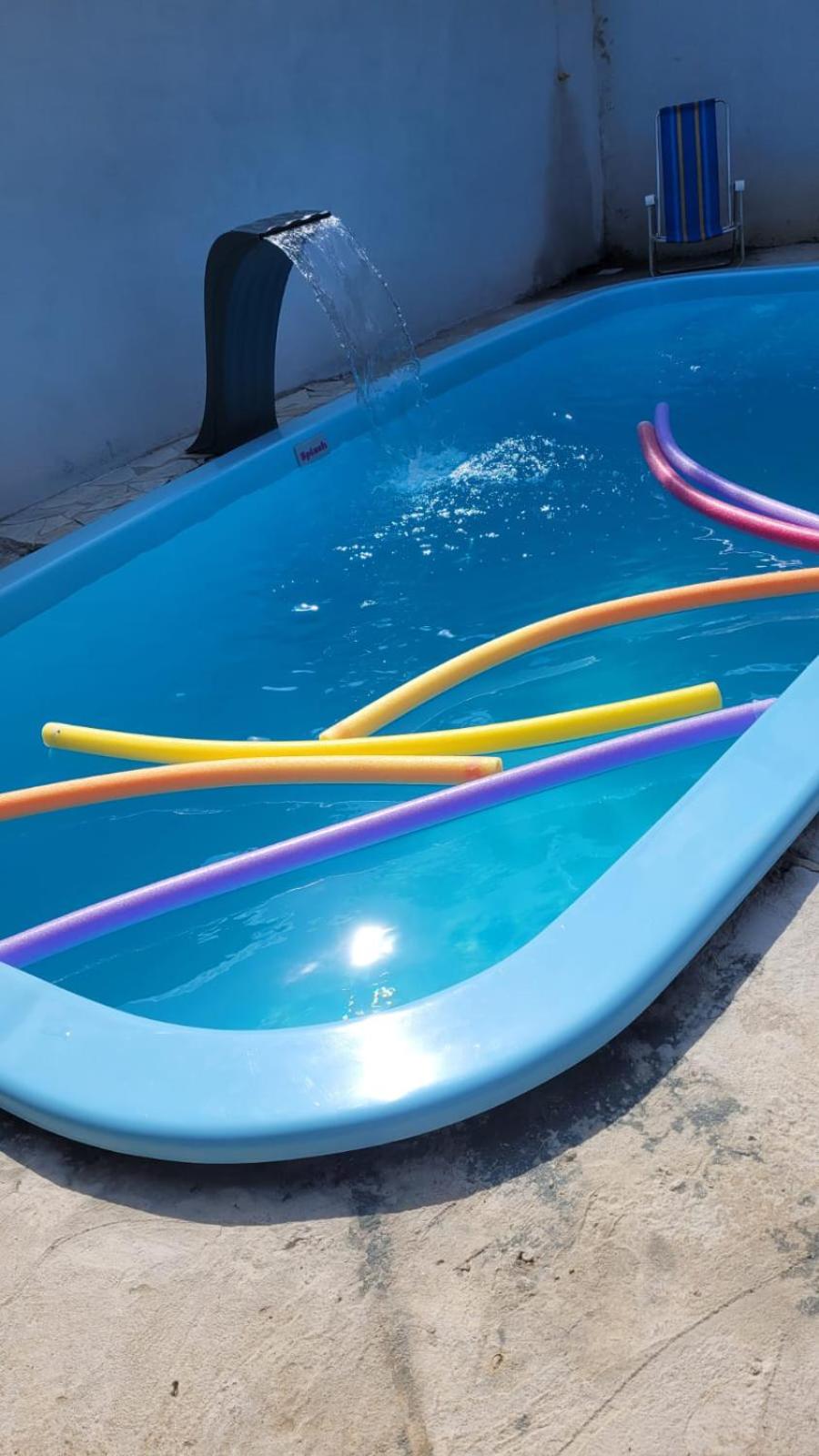 Casa com piscina e churrasqueira!