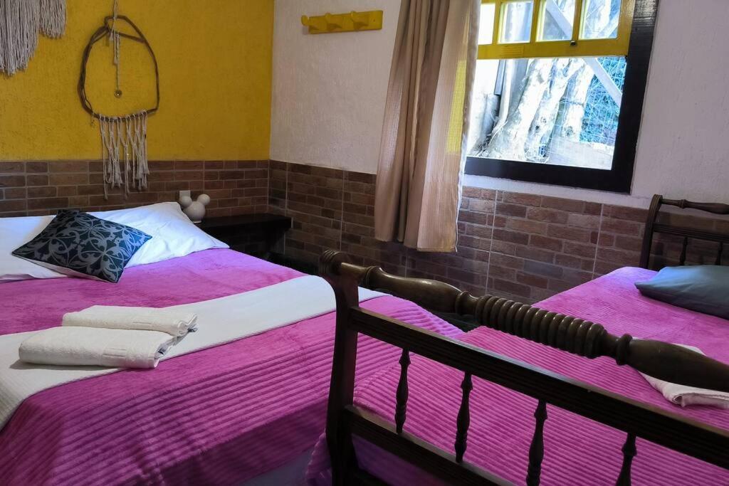 Casa rústica com piscina em Búzios na Villa Geriba