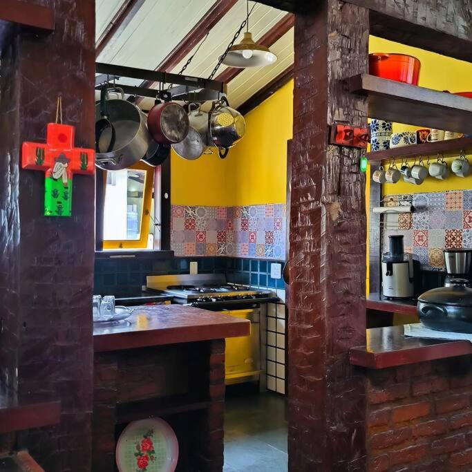 Casa rústica com piscina em Búzios na Villa Geriba