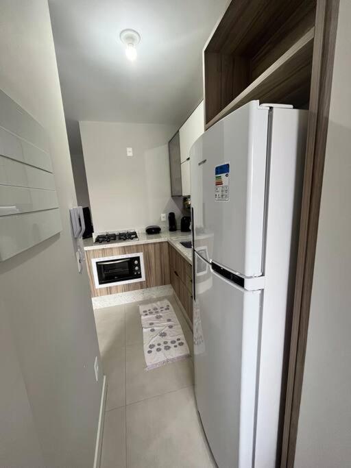 Apartamento 2 Suítes com piscina e churrasqueira, ao lado da UFSC