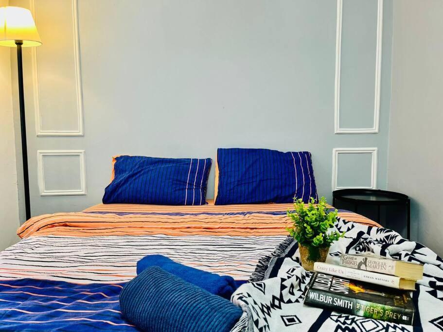 9 pax Homestay near Axiata Arena & Pavilion 2