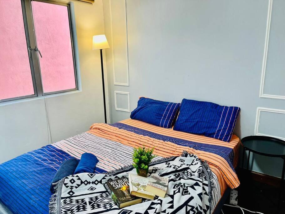 9 pax Homestay near Axiata Arena & Pavilion 2