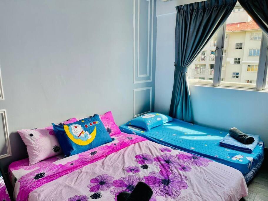 9 pax Homestay near Axiata Arena & Pavilion 2