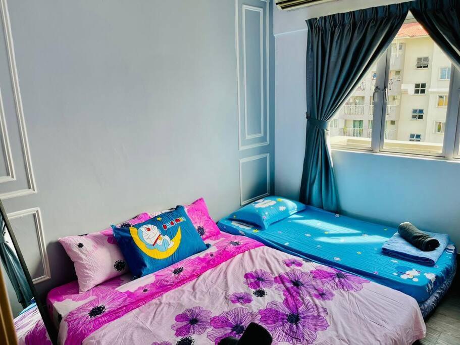 9 pax Homestay near Axiata Arena & Pavilion 2
