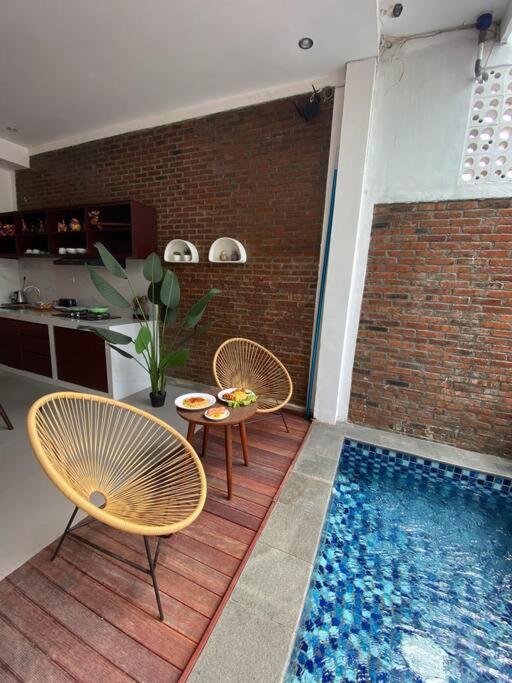 Emka Villa Traditional Minimalist view 2