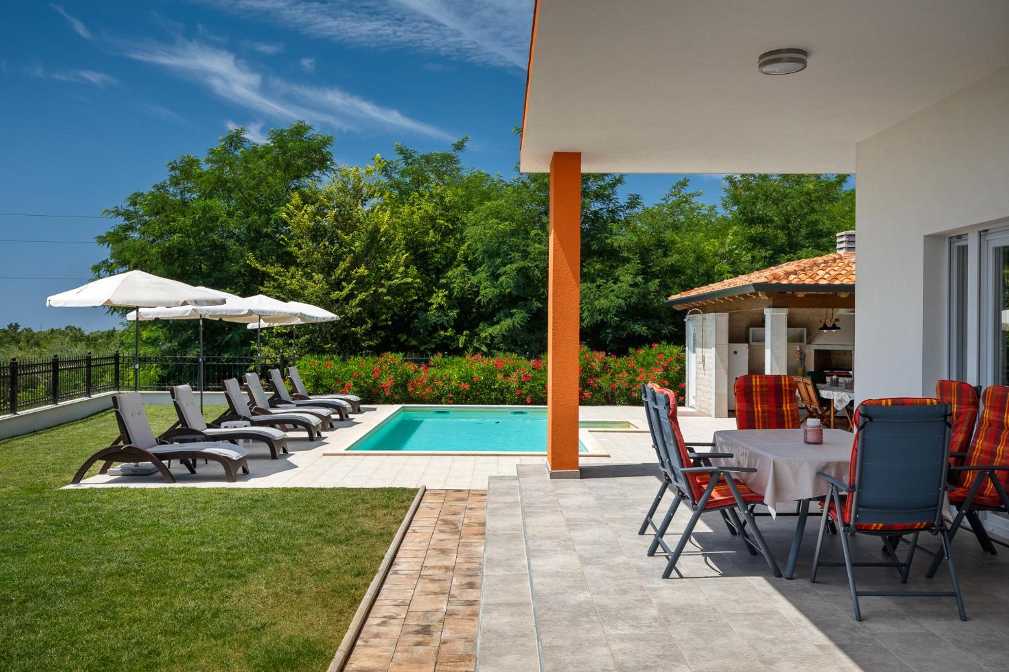 Modern villa Eva Kastel with pool near Buje view 4