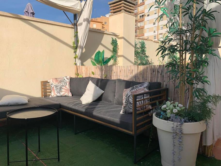 Estudio Capuchinos en Málaga — balance & terrace
