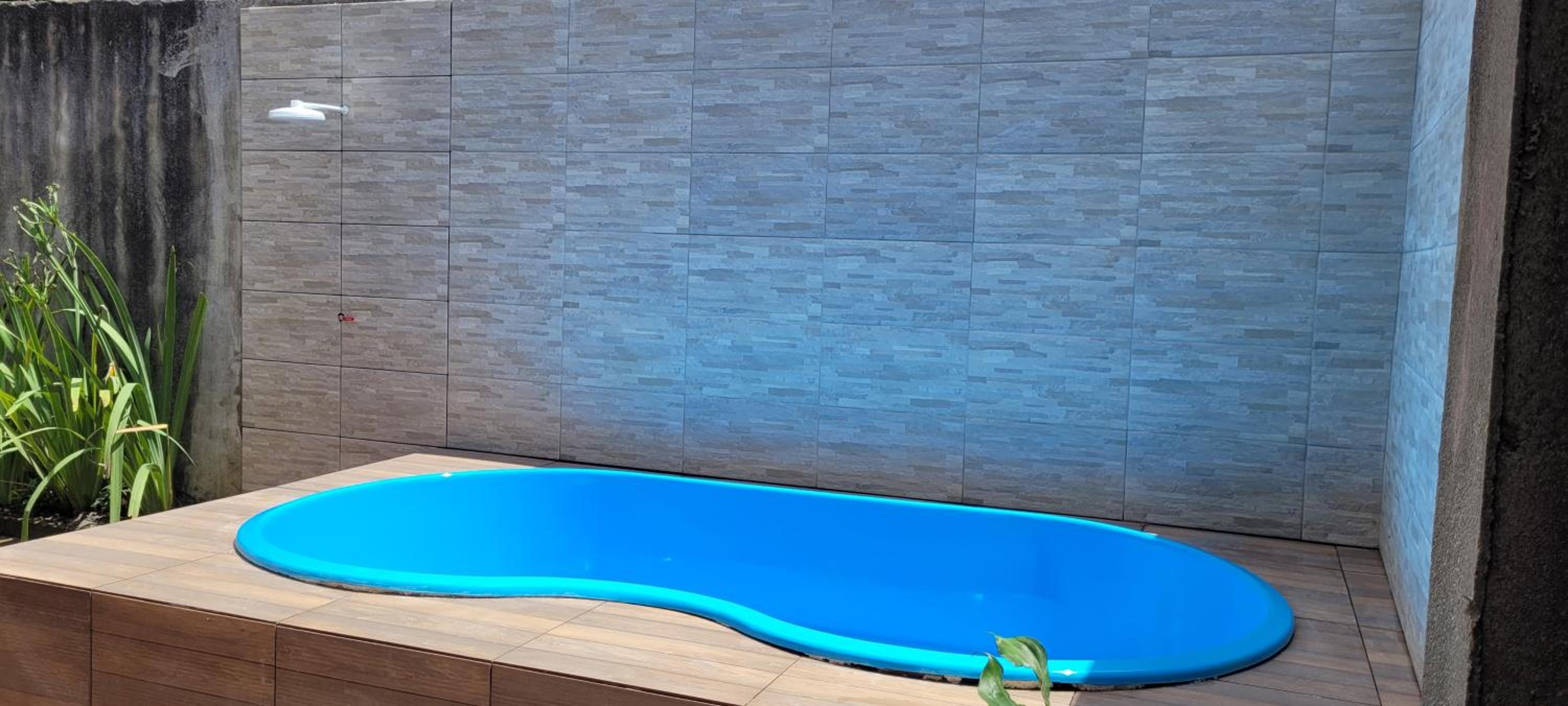 Casa com piscina a 4 min do centro de carro