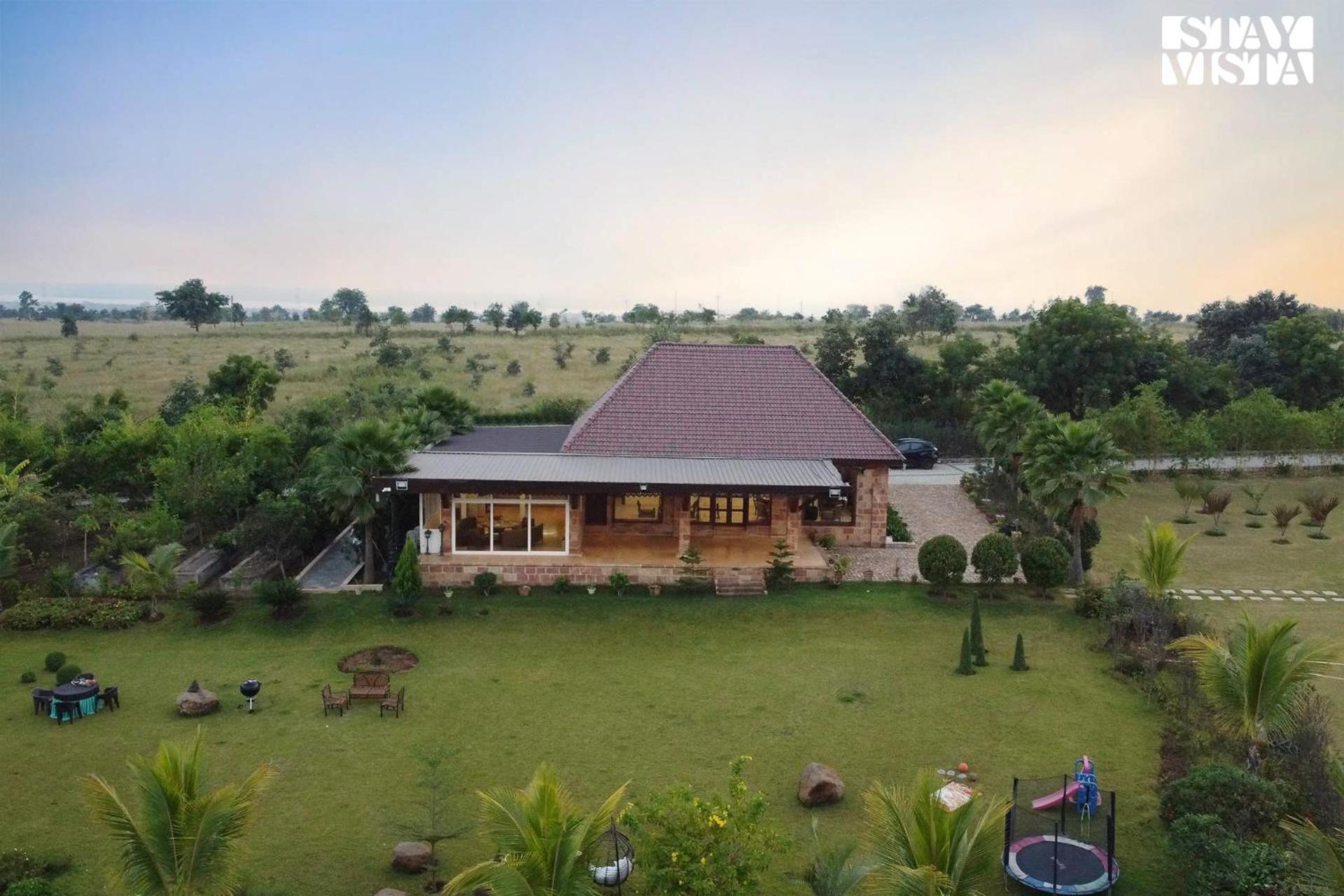 StayVista's Lakeside Whispers - Lake & Mountain-View Villa with Lawn & Indoor-Outdoor Games view 2