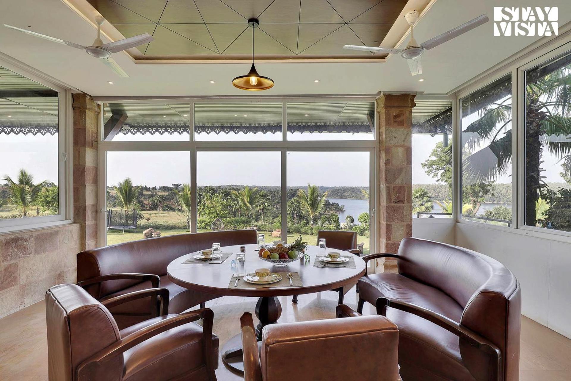 StayVista's Lakeside Whispers - Lake & Mountain-View Villa with Lawn & Indoor-Outdoor Games view 4