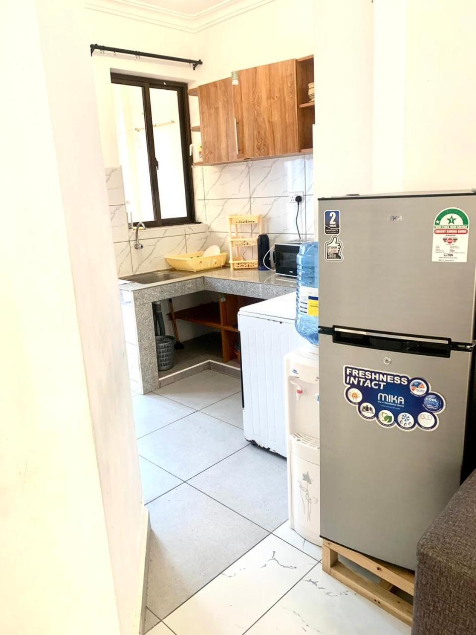 Cozy 2 bedroom, master en-suite Apartment in Bamburi with secure environment WIFI Netflix and 10min drive to the beach view 5
