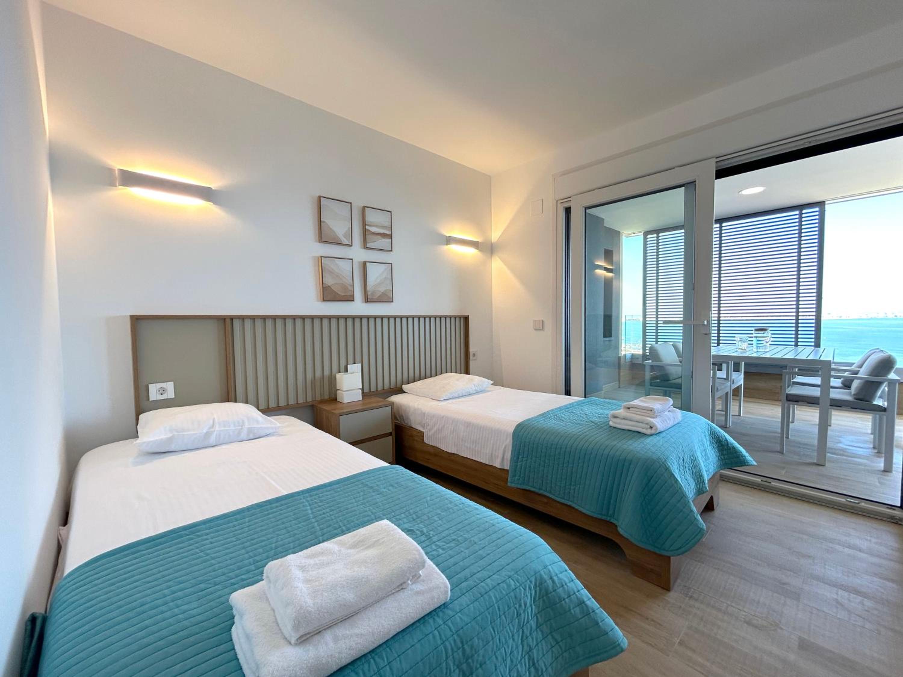 POSIDONIA PUNTA PRIMA - Luxury Seafront Apartments