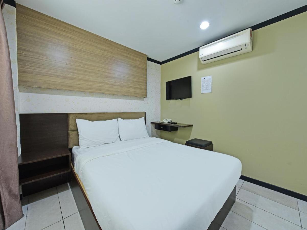 OYO 91009 One Enigma Hotel photo 3