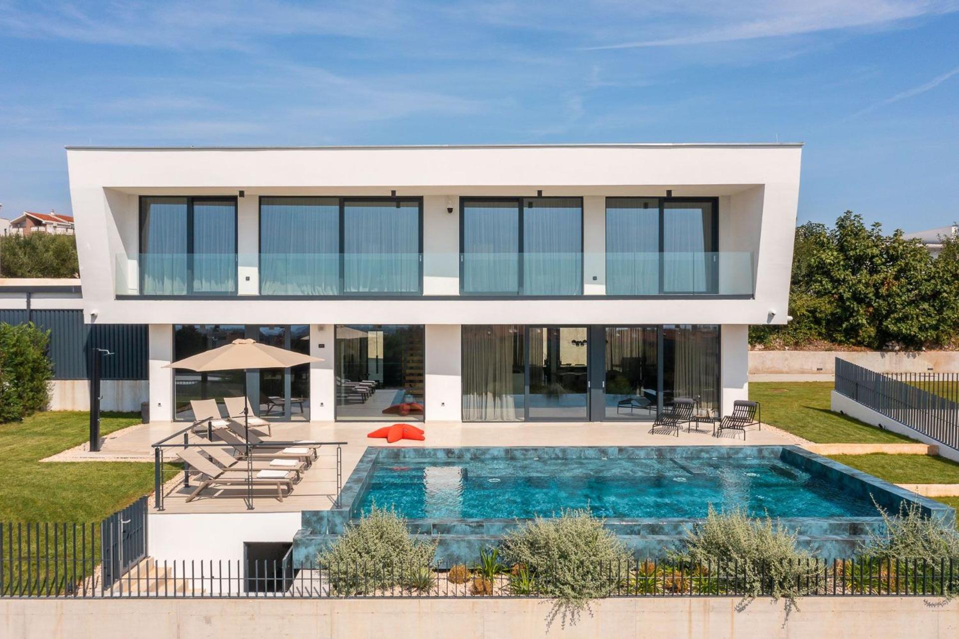 Luxury Villa 22 with heated infinity pool view 3