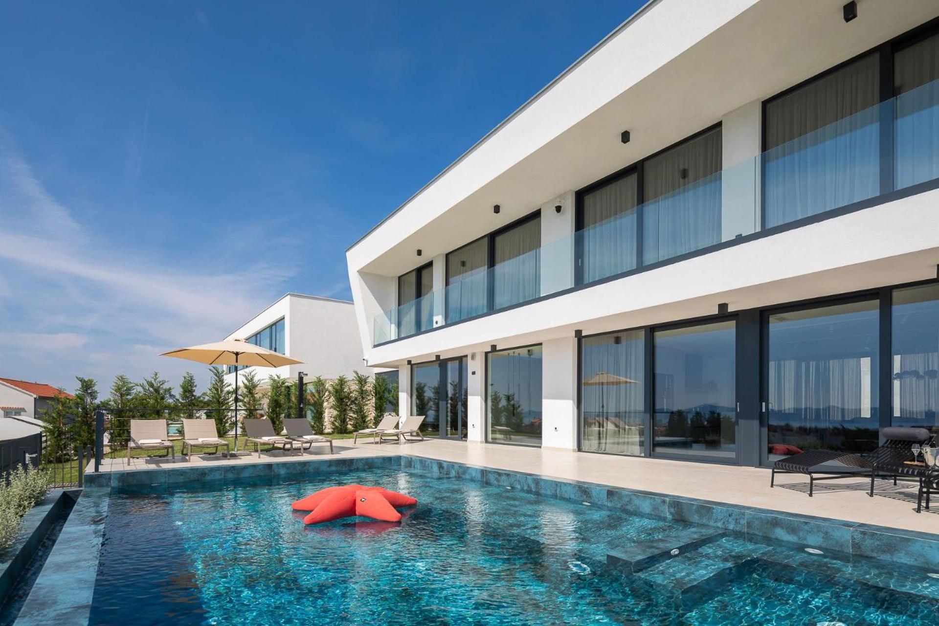 Luxury Villa 22 with heated infinity pool view 5