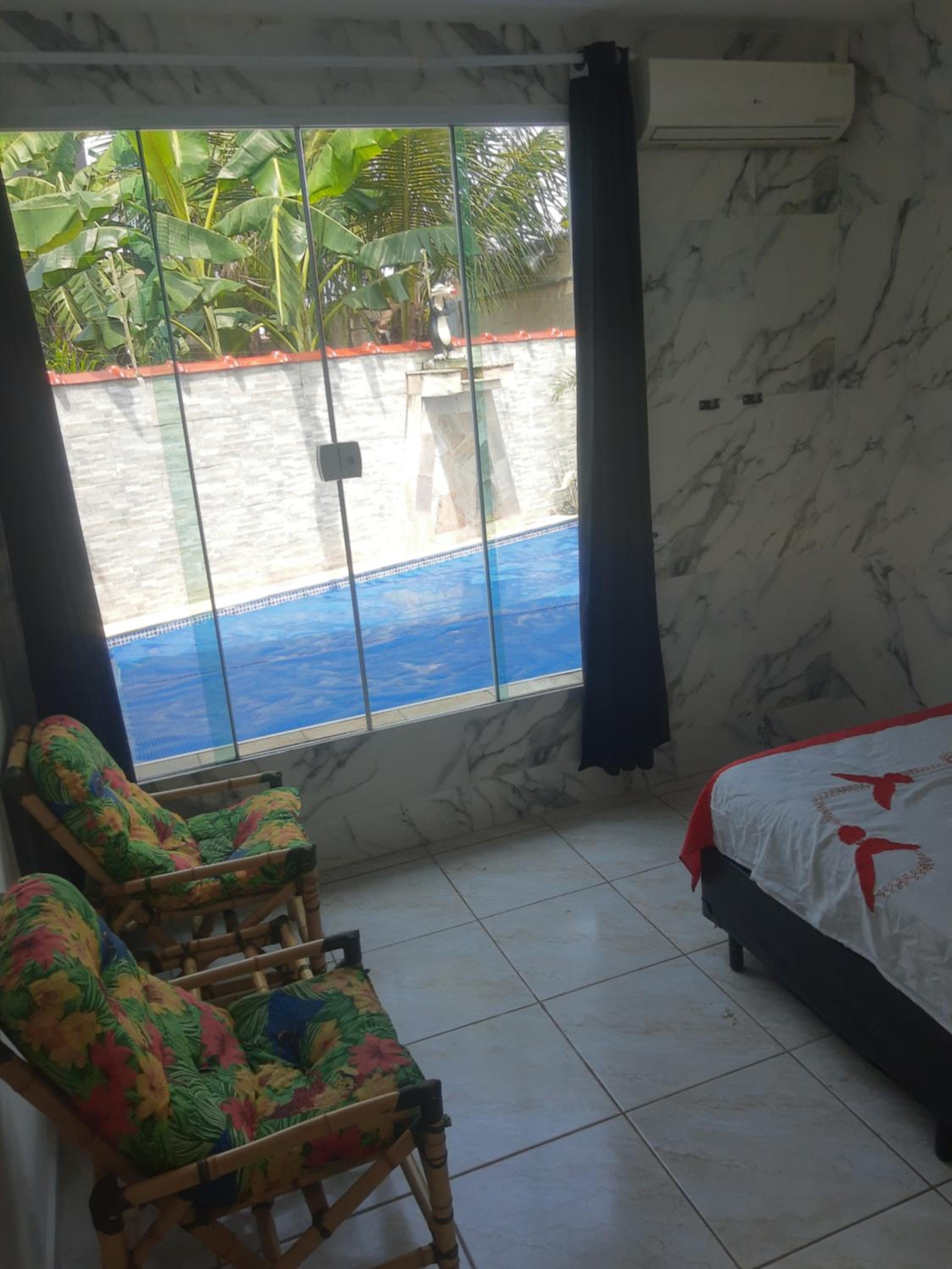 Casa com Piscina Aquecida e Ar Condicionado