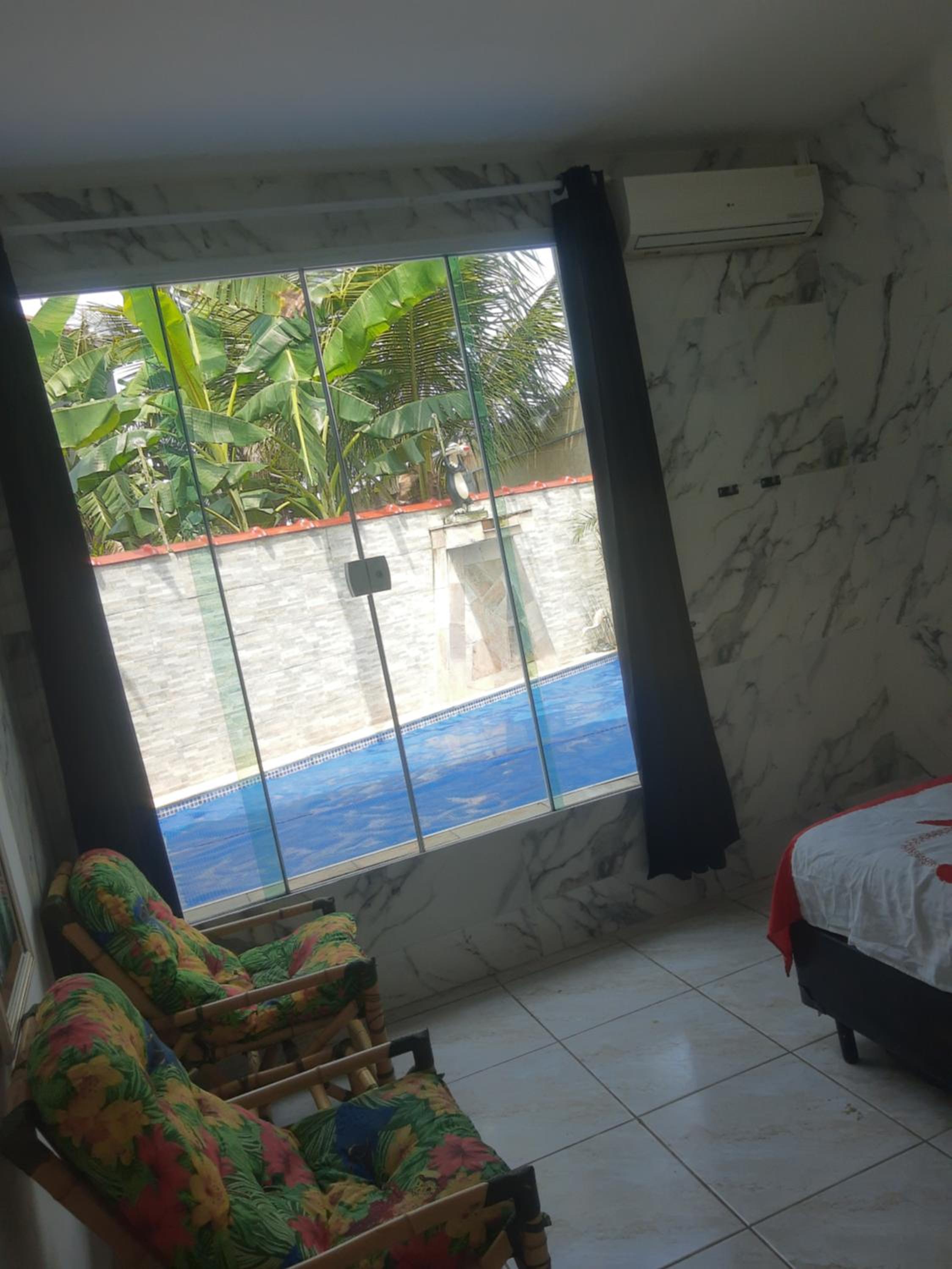 Casa com Piscina Aquecida e Ar Condicionado