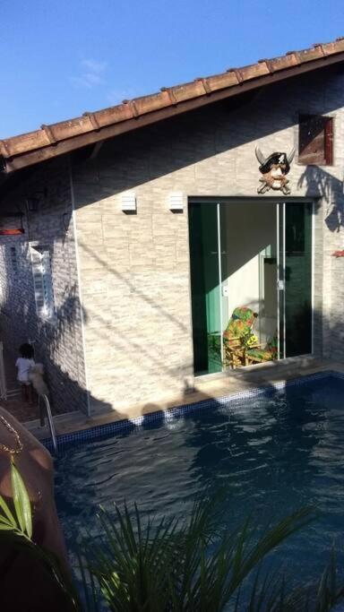 Casa com Piscina Aquecida e Ar Condicionado
