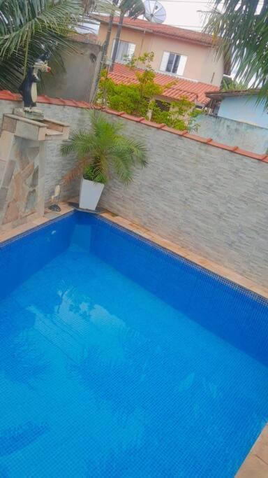 Casa com Piscina Aquecida e Ar Condicionado
