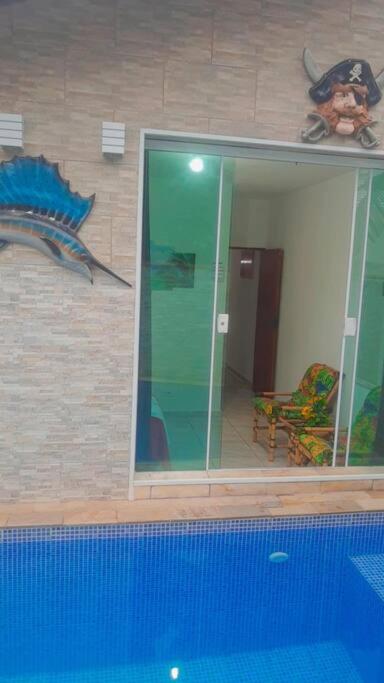 Casa com Piscina Aquecida e Ar Condicionado