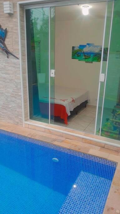Casa com Piscina Aquecida e Ar Condicionado