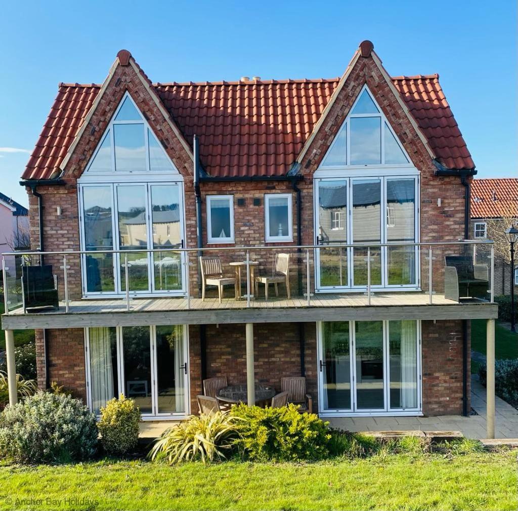Pearl & Spice Hideaways - 2 two bedroom cottages nearby - Part of the The Bay Filey Holiday Village with pool, gym and direct beach access, pub, restaurant view 3