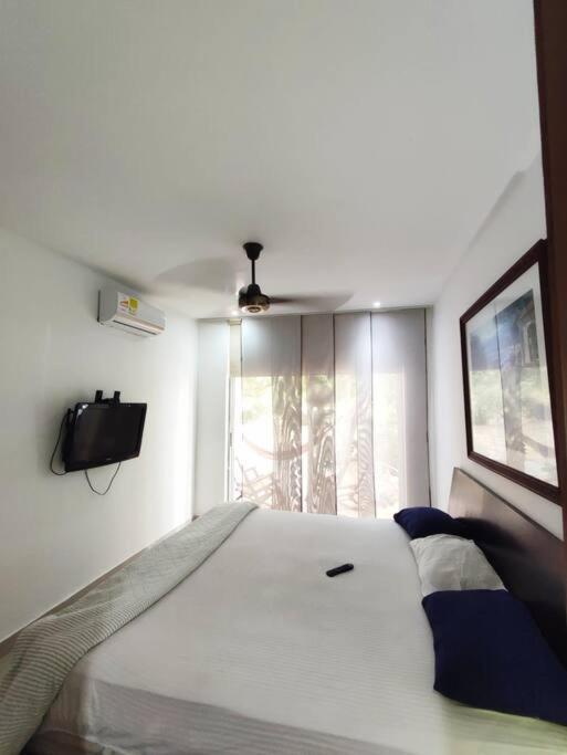Apartamento con piscina y parrilla BBQ en Laguna Club
